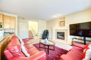 Photo 7: 41 Cougartown Circle SW in Calgary: Cougar Ridge Detached for sale : MLS®# A2097769