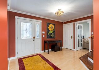 Photo 2: 152 Bay View Drive SW in Calgary: Bayview Detached for sale : MLS®# A1180374