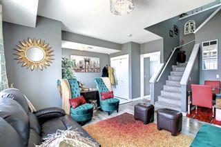 Photo 6: 6 67 West Coach Manor SW in Calgary: West Springs Row/Townhouse for sale : MLS®# A1226623