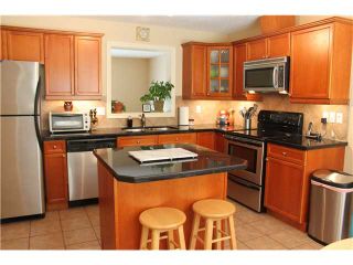 Photo 4: 82 CRYSTAL SHORES Cove: Okotoks Townhouse for sale : MLS®# C3619888