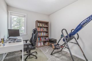 Photo 14: 14 Coachway Gardens SW in Calgary: Coach Hill Row/Townhouse for sale : MLS®# A2050354