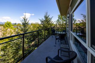 Photo 19: 317 20861 83 Avenue in Langley: Willoughby Heights Condo for sale in "Athenry Gate" : MLS®# R2879460