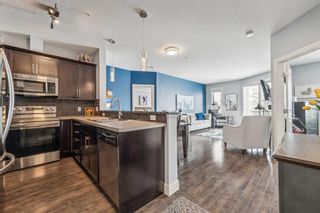 Photo 4: 3204 15 Sunset Square: Cochrane Apartment for sale : MLS®# A2129255