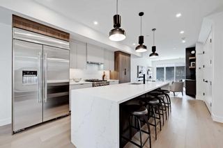 Photo 6: 1409 10 Avenue SE in Calgary: Inglewood Semi Detached (Half Duplex) for sale : MLS®# A2140370