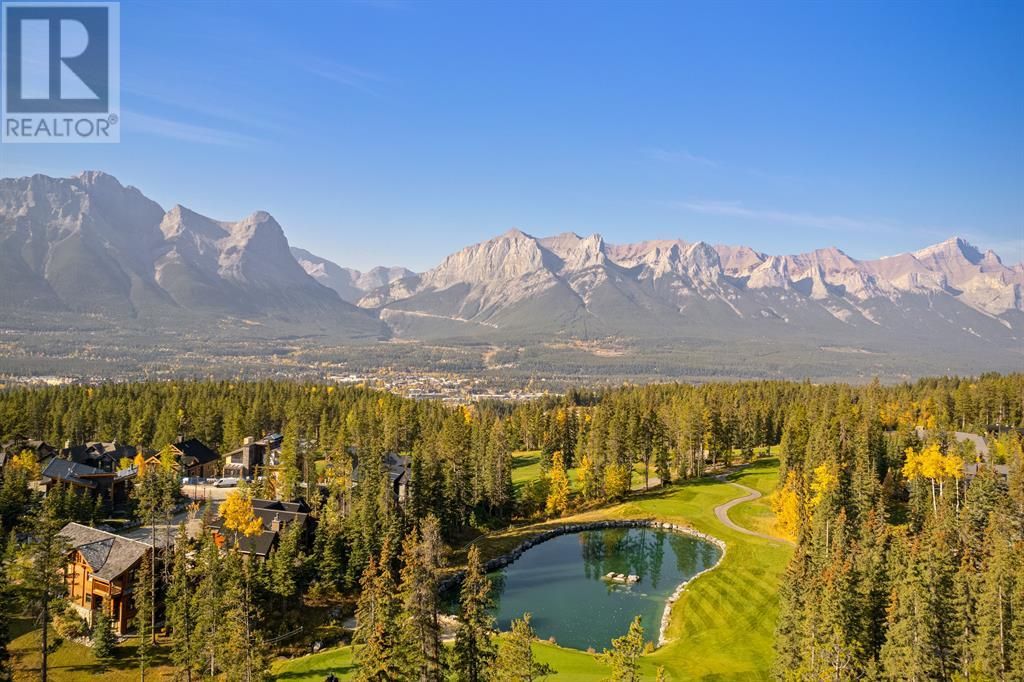 Main Photo: 553 Silvertip Road in Canmore: House for sale : MLS®# A2011740
