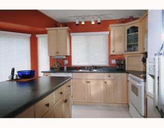 Photo 6: 3300 RAKANNA Place in Coquitlam: Hockaday House for sale : MLS®# V808044