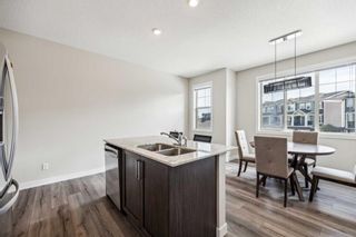 Photo 9: 227 Sage Hill Grove NW in Calgary: Sage Hill Row/Townhouse for sale : MLS®# A2132688