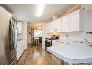 Photo 13: 17 8670 156 Street in Surrey: Fleetwood Tynehead Manufactured Home for sale in "WESTWOOD COURT" : MLS®# R2612269