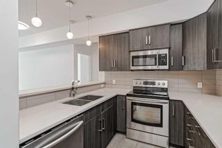 Photo 8: 104 611 Edmonton Trail NE in Calgary: Crescent Heights Apartment for sale : MLS®# A2081473