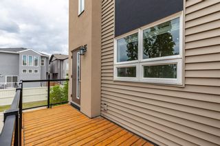 Photo 26: 404 Covecreek Circle NE in Calgary: Coventry Hills Row/Townhouse for sale : MLS®# A1217696