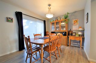 Photo 10: 10 388 Sandarac Drive NW in Calgary: Sandstone Valley Row/Townhouse for sale : MLS®# A1181075