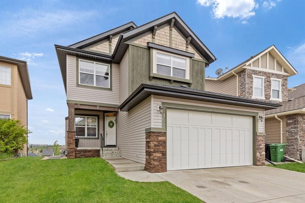 Main Photo: 100 Tremblant Way SW in Calgary: Springbank Hill Detached for sale : MLS®# A1230428