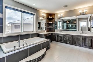 Photo 24: 141 TREMBLANT Heights SW in Calgary: Springbank Hill House for sale : MLS®# C4175148