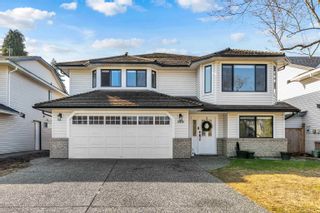Photo 1: 19046 DOERKSEN Drive in Pitt Meadows: Central Meadows House for sale in "Highland Park" : MLS®# R2762039