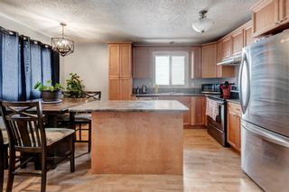 Photo 5: 240 Ranchview Place NW in Calgary: Ranchlands Detached for sale : MLS®# A2030351