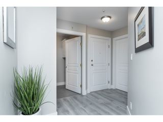 Photo 4: 406 20288 54 Avenue in Langley: Langley City Condo for sale in "Langley City" : MLS®# R2432392