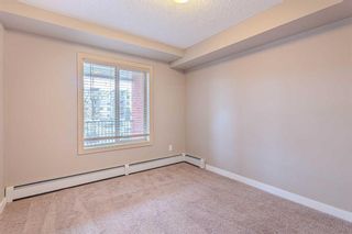 Photo 10: 211 403 Mackenzie Way SW: Airdrie Apartment for sale : MLS®# A2125740