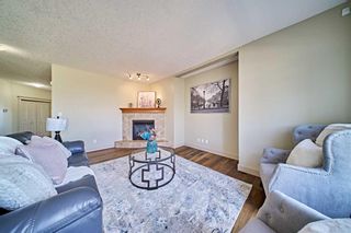 Photo 4: 12 Crestmont Way SW in Calgary: Crestmont Detached for sale : MLS®# A2130928