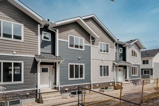 Photo 1: 306 137 Red Embers Link NE in Calgary: Redstone Row/Townhouse for sale : MLS®# A2129689