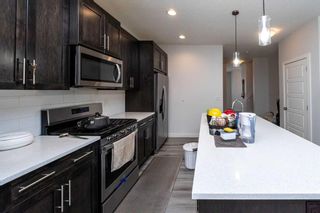 Photo 6: 731 Redstone Drive in Calgary: Redstone Semi Detached (Half Duplex) for sale : MLS®# A2125934