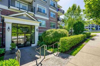 Photo 1: 402 19530 65 Avenue in Surrey: Clayton Condo for sale in "WILLOW GRAND" (Cloverdale)  : MLS®# R2587452