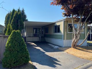 Photo 1: 15854 NORFOLK Road in Surrey: King George Corridor Manufactured Home for sale in "Cranley" (South Surrey White Rock)  : MLS®# R2727469