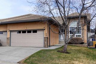 Main Photo: 48 Shannon Estates Terrace SW in Calgary: Shawnessy Semi Detached (Half Duplex) for sale : MLS®# A2124426