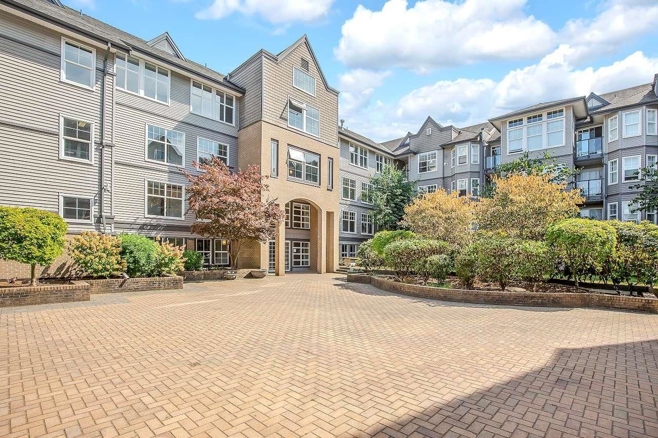 Main Photo: 121 20200 56 Avenue in Langley: Langley City Condo for sale in "The Bentley" : MLS®# R2718213