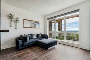 Main Photo: 4 145 Rockyledge View NW in Calgary: Rocky Ridge Row/Townhouse for sale : MLS®# A2136269