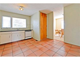 Photo 6: 6628 LETHBRIDGE Crescent SW in Calgary: Lakeview House for sale : MLS®# C4055225