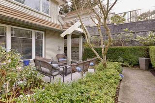 Photo 1: 5 2351 PARKWAY Boulevard in Coquitlam: Westwood Plateau Townhouse for sale in "WINDANCE" : MLS®# R2546184