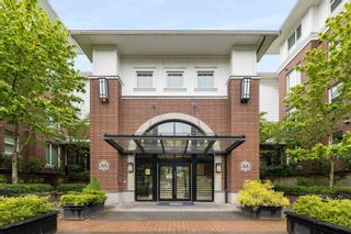 Photo 1: 217 9399 ODLIN Road in Richmond: West Cambie Condo for sale in "MAYFAIR PLACE" : MLS®# R2706296
