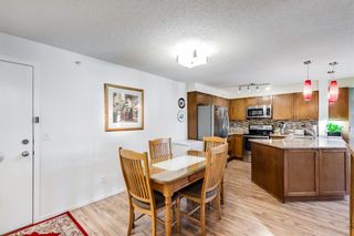 Photo 7: 7403 304 Mackenzie Way SW: Airdrie Apartment for sale : MLS®# A1251468