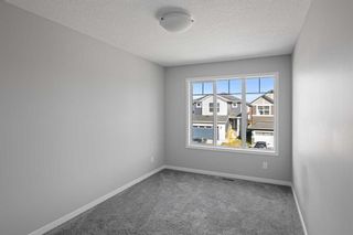 Photo 34: 97 Creekside Avenue SW in Calgary: C-168 Detached for sale : MLS®# A2085252