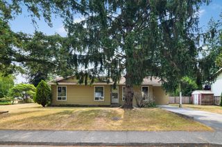 Photo 1: 4550 202 Street in Langley: Langley City House for sale : MLS®# R2720202
