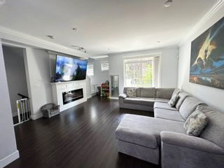 Photo 4: 10 14285 64 Avenue in Surrey: East Newton Townhouse for sale in "Aria Living" : MLS®# R2867831
