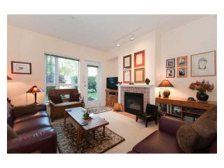 Photo 2: 108 6198 ASH Street in Vancouver: Oakridge VW Condo for sale in "THE GROVE" (Vancouver West)  : MLS®# V843824