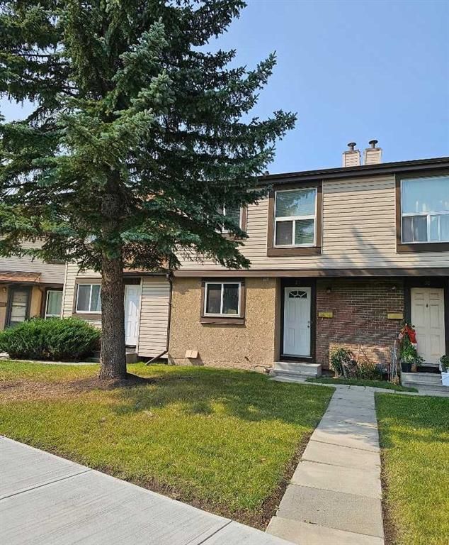 Main Photo: 34 2727 Rundleson Road NE in Calgary: Rundle Row/Townhouse for sale : MLS®# A2080579
