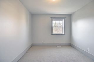 Photo 23: 63 Wentworth Common SW in Calgary: West Springs Row/Townhouse for sale : MLS®# A1124475