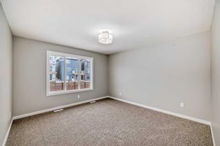 Photo 18: 199 Lucas Close NW in Calgary: Livingston Detached for sale : MLS®# A2118583