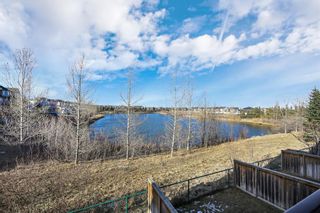 Photo 1: 66 Eversyde Park SW in Calgary: Evergreen Row/Townhouse for sale : MLS®# A1201739