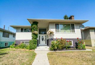 Photo 1: 1437 E 63RD Avenue in Vancouver: Fraserview VE House for sale (Vancouver East)  : MLS®# R2426997