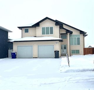 Photo 1: 207 Lehrer Place in Saskatoon: Hampton Village Residential for sale : MLS®# SK913993