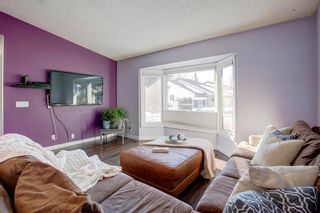 Photo 4: 140 Woodford Drive SW in Calgary: Woodbine Detached for sale : MLS®# A1083226