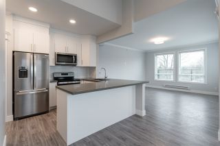 Photo 12: 504 2229 ATKINS Avenue in Port Coquitlam: Central Pt Coquitlam Condo for sale in "Downtown Pointe" : MLS®# R2553513
