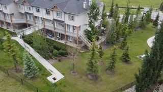 Photo 6: 1 108 Rockyledge View NW in Calgary: Rocky Ridge Row/Townhouse for sale : MLS®# A1234759