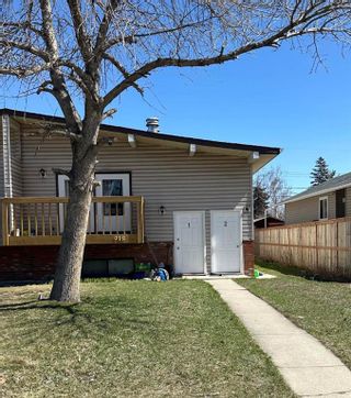 Photo 2: 918 40 Street SE in Calgary: Forest Lawn Semi Detached (Half Duplex) for sale : MLS®# A2132383