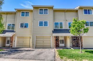 Photo 1: 350 Point Mckay Gardens NW in Calgary: Point McKay Row/Townhouse for sale : MLS®# A1233187