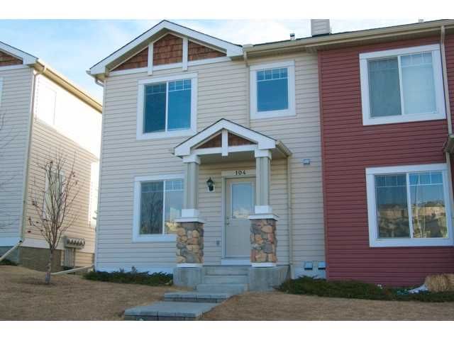 Main Photo: 104 PANAMOUNT Drive NW in CALGARY: Panorama Hills Townhouse for sale (Calgary)  : MLS®# C3559470