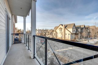 Photo 21: 119 Couture Crescent SW in Calgary: Garrison Green Row/Townhouse for sale : MLS®# A1197042